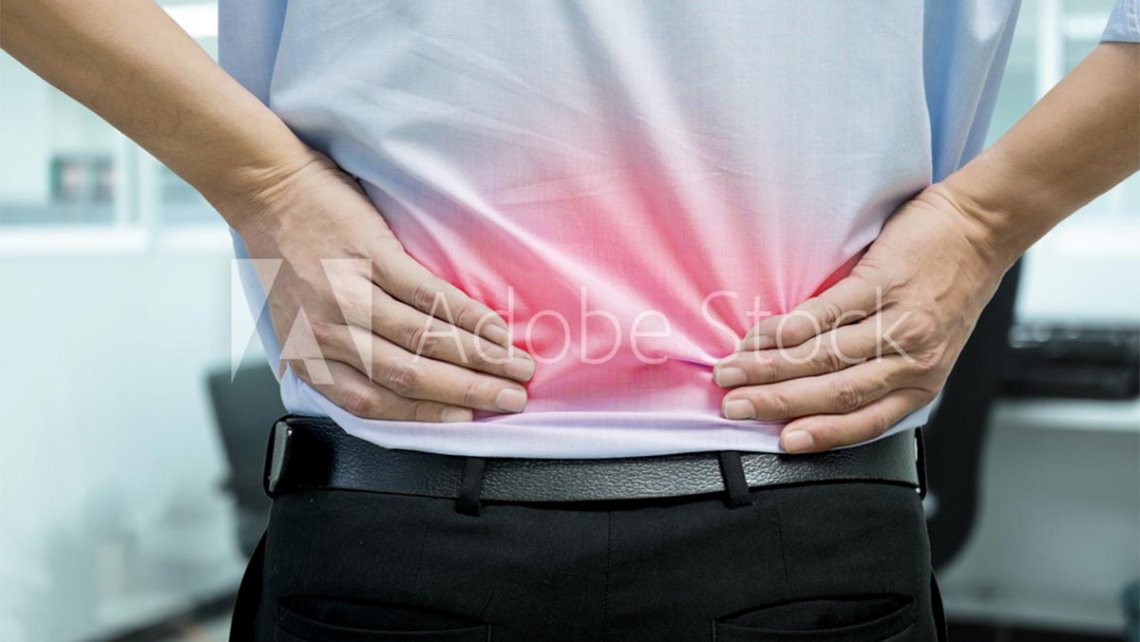 Man suffering with back pain
